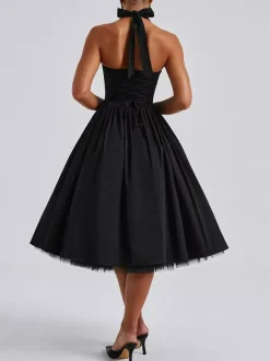Robe de soirée mi-longue rose pâle à dos nu et coupe trapèze pour femme 2026