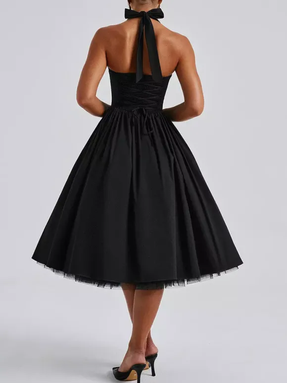 Robe de soirée mi-longue rose pâle à dos nu et coupe trapèze pour femme 2026