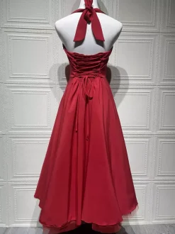 Robe de soirée mi-longue rose pâle à dos nu et coupe trapèze pour femme 2026