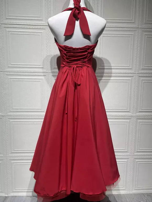 Robe de soirée mi-longue rose pâle à dos nu et coupe trapèze pour femme 2026