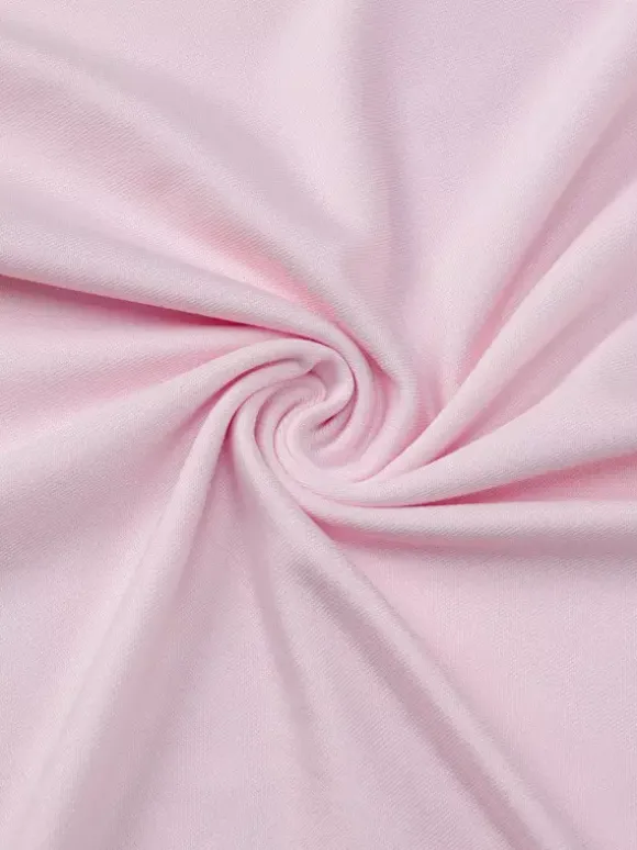 Robe de soirée moulante rose poudré à décolleté plongeant et dos nu froncé
