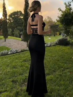 Robe de soirée noire sirène maxi dos nu en dentelle ajourée taille froncée
