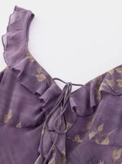 Robe de tous les jours pour femme à fleurs violettes sans manches col en V et taille haute.