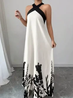 Robe de vacances maxi dos nu à lacets sans manches imprimé floral col halter élégante blanche