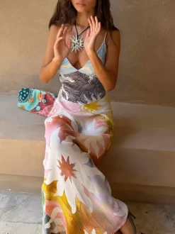 Robe de vacances maxi dos nu sans manches à imprimé floral et col en V jaune chic