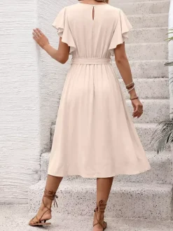 Robe de vacances mi-longue fluide à col rond et manches papillon