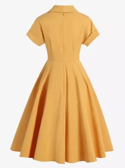 Robe glamour vintage à col rabattu et boutons style années 50 manches courtes taille moyenne jaune rockabilly