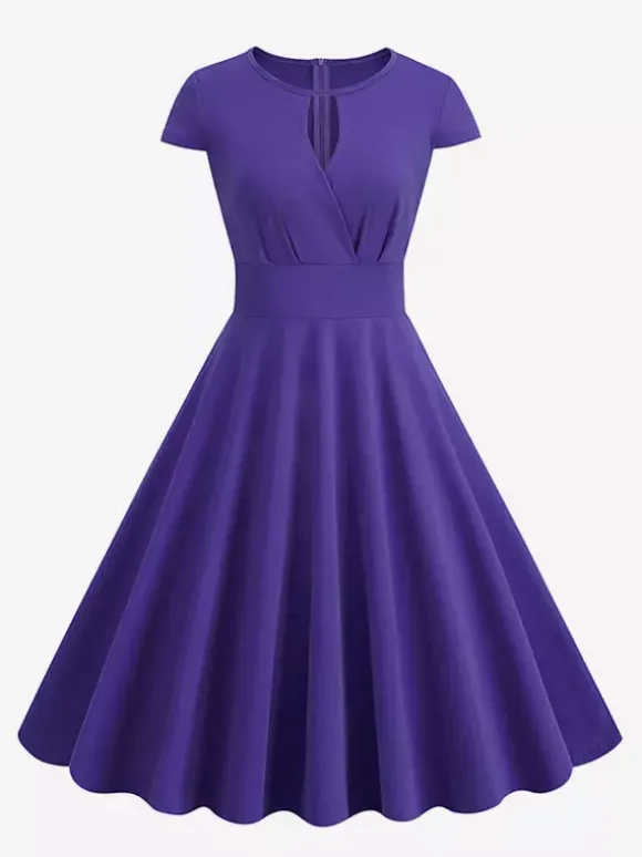 Robe glamour vintage style années 50 col rond manches courtes découpées coupe trapèze moyenne