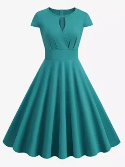 Robe glamour vintage style années 50 col rond manches courtes découpées coupe trapèze moyenne