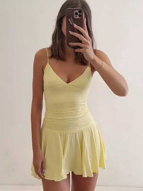 Robe jaune sexy mini à lacets sans manches dos nu et bretelles.