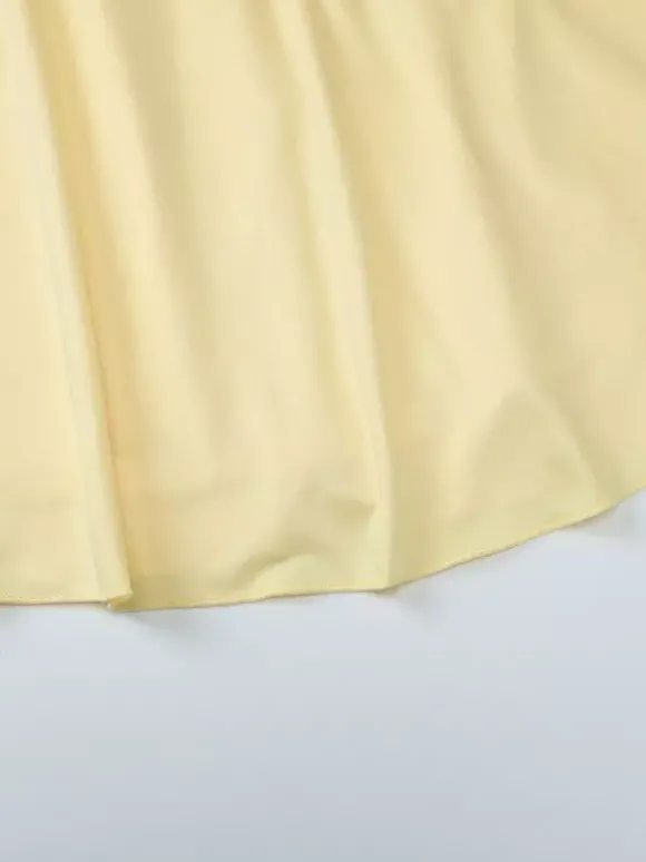 Robe jaune sexy mini à lacets sans manches dos nu et bretelles.
