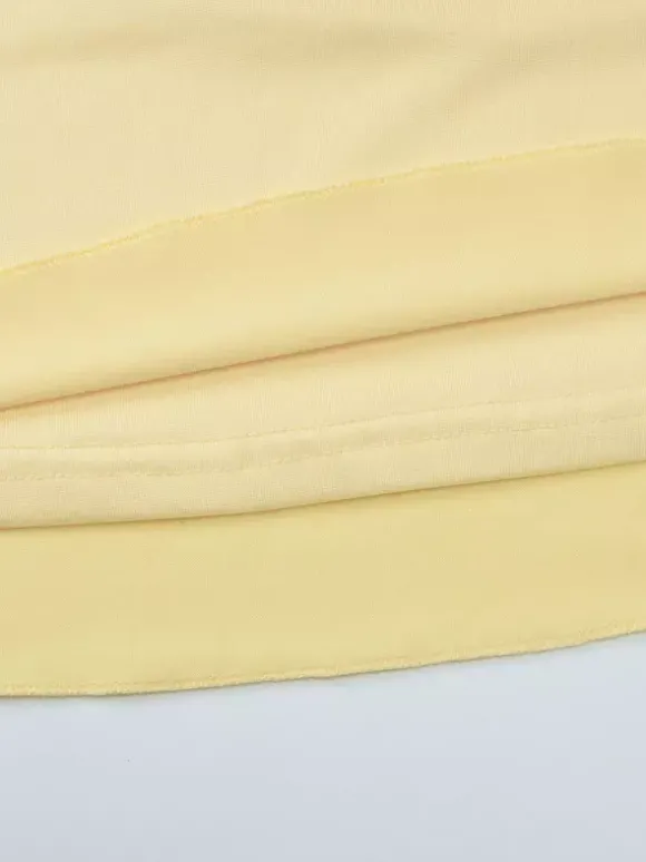 Robe jaune sexy mini à lacets sans manches dos nu et bretelles.