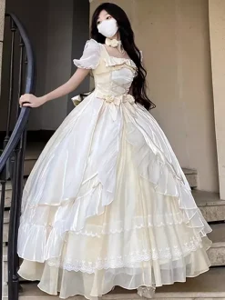 Robe Lolita douce en maille de soie à manches courtes robe à volants superposés style thé robe longue