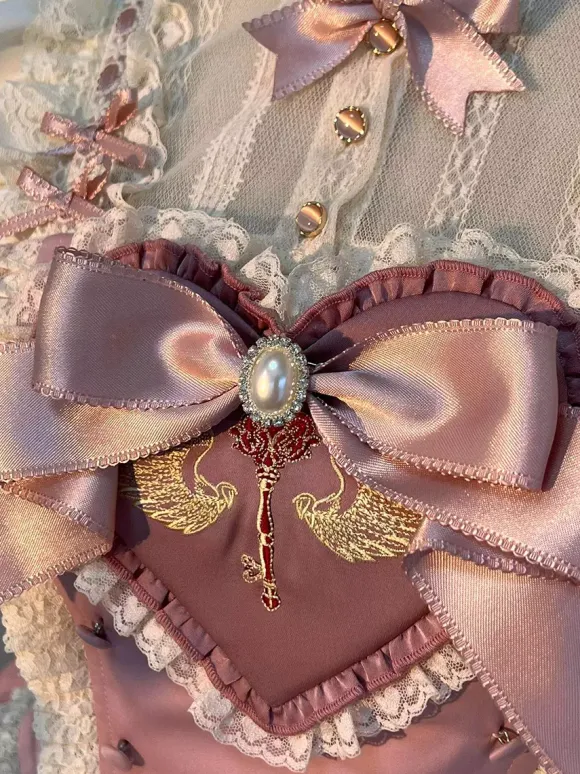 Robe Lolita rose Sweet Lolita à décolleté c艙ur n艙uds et volants
