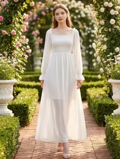Robe longue blanche pour femme manches longues col carré taille haute style académique.