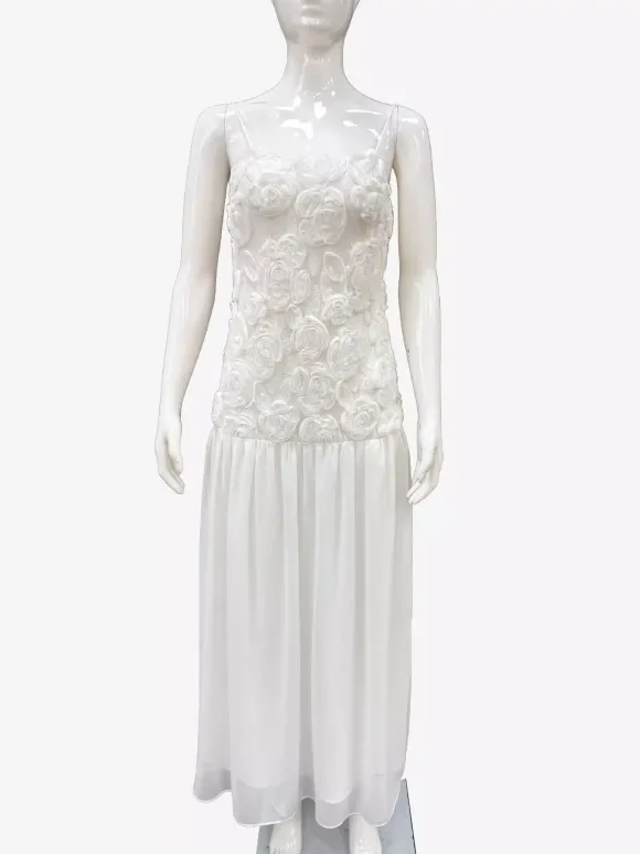Robe longue à bretelles spaghetti fluides corsage à rosettes style bohème - Collection été 2026