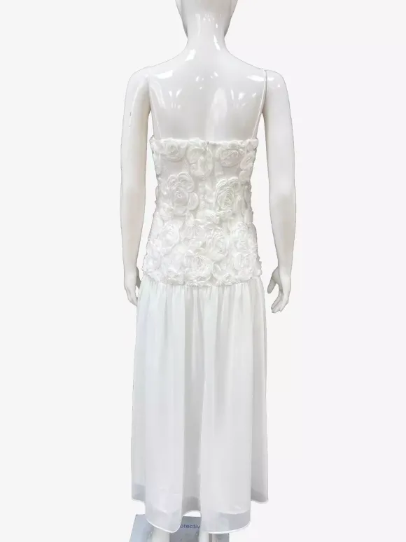 Robe longue à bretelles spaghetti fluides corsage à rosettes style bohème - Collection été 2026