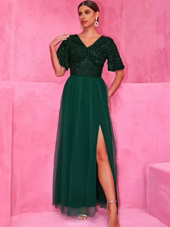 Robe longue de soirée vert foncé à paillettes et fente haute pour soirées 2026