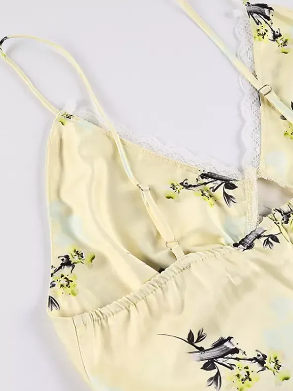 Robe longue d'été chic abricot sans manches dos nu bretelles et décolleté.