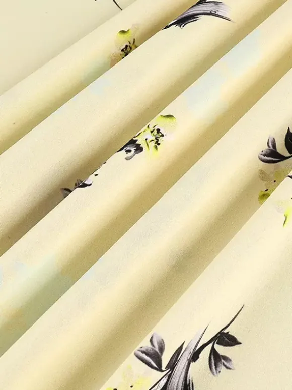 Robe longue d'été chic abricot sans manches dos nu bretelles et décolleté.