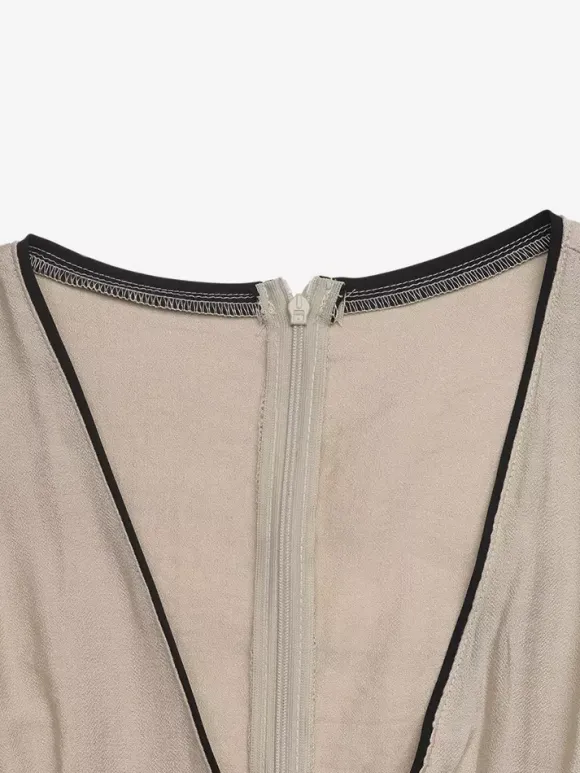 Robe longue d'été fluide à col en V sans manches bicolore chic à lacets idéale pour les vacances.