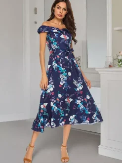 Robe longue d'été élégante à imprimé floral épaules dénudées sans manches et fermeture éclair.