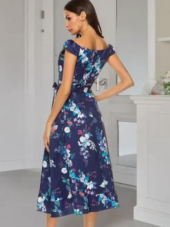 Robe longue d'été élégante à imprimé floral épaules dénudées sans manches et fermeture éclair.