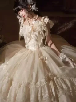 Robe longue Lolita fée blanche à lacets et n艙uds ornée de fleurs idéale pour un goûter.