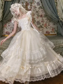 Robe longue Lolita fée blanche à lacets et n艙uds ornée de fleurs idéale pour un goûter.