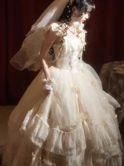 Robe longue Lolita fée blanche à lacets et n艙uds ornée de fleurs idéale pour un goûter.