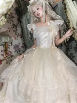 Robe longue Lolita fée blanche à lacets et n艙uds ornée de fleurs idéale pour un goûter.