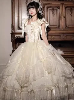 Robe longue Lolita fée blanche à lacets et n艙uds ornée de fleurs idéale pour un goûter.