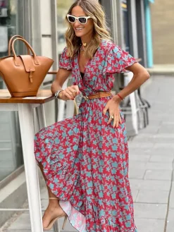 Robe longue portefeuille à col V et imprimé floral pour femme - Robe bohème à manches papillon et ourlet à volants - Idéale pour les vacances d'été à la plage 2026