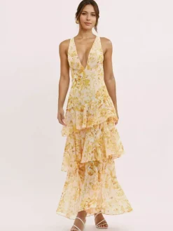 Robe longue à volants superposés et imprimé floral avec décolleté en V profond et dos ouvert 2026