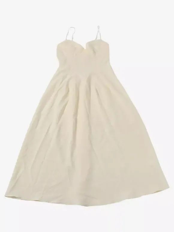 Robe maxi sans manches à bretelles col montant taille haute dos nu plissée couleur abricot.