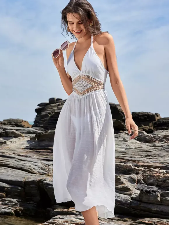 Robe mi-longue blanche cache-c艙ur à col licou pour la plage d'été 2026