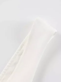 Robe mini blanche sans manches coupe trapèze évasée collection femme 2026
