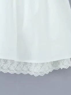 Robe mini-corset jaune beurre sans manches avec bordure en dentelle et dos lacé 2026