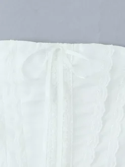 Robe mini-corset jaune beurre sans manches avec bordure en dentelle et dos lacé 2026