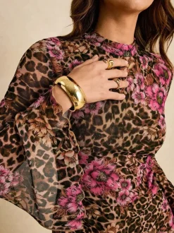 Robe mini léopard à imprimé floral et fente manches évasées collection femme 2026