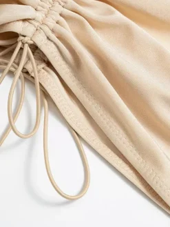 Robe moulante dos nu sexy à découpes pour femme tenue de club mi-longue 2026