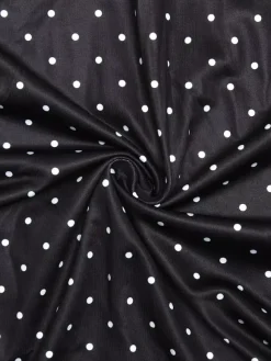 Robe noire cintrée et élégante à pois parfaite pour les sorties décontractées.