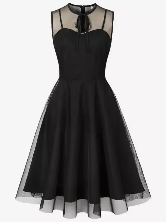 Robe rétro bordeaux transparente style années 50 sans manches col rond coupe rockabilly longueur moyenne.