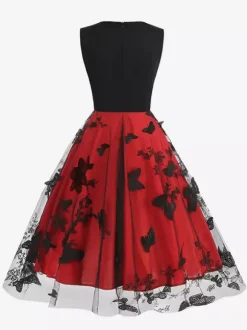 Robe rétro glamour années 50 noire bicolore à volants brodée sans manches col en V style rockabilly