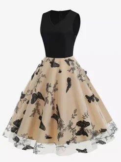 Robe rétro glamour années 50 noire bicolore à volants brodée sans manches col en V style rockabilly
