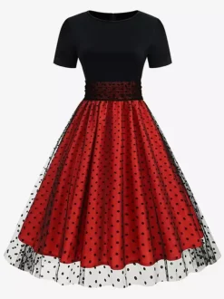 Robe rétro glamour style années 50 col rond manches courtes superposées taille moyenne à pois style rockabilly