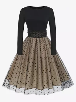 Robe rétro glamour style années 50 col rond manches courtes superposées taille moyenne à pois style rockabilly