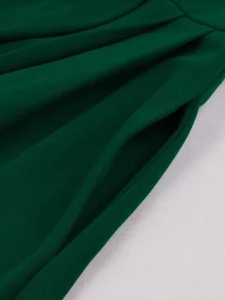 Robe rétro swing à manches courtes et col à revers contrastant pour femme 2026