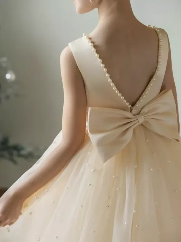 Robes de demoiselle d'honneur de mariage Robes d'occasion spéciale Champagne Perles sans manches