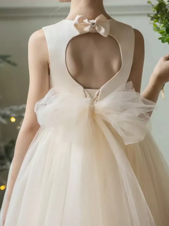 Robes de demoiselle d'honneur de mariage Robes d'occasion spéciale Champagne Arcs sans manches